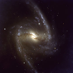 galaxia espiral barrada fornax